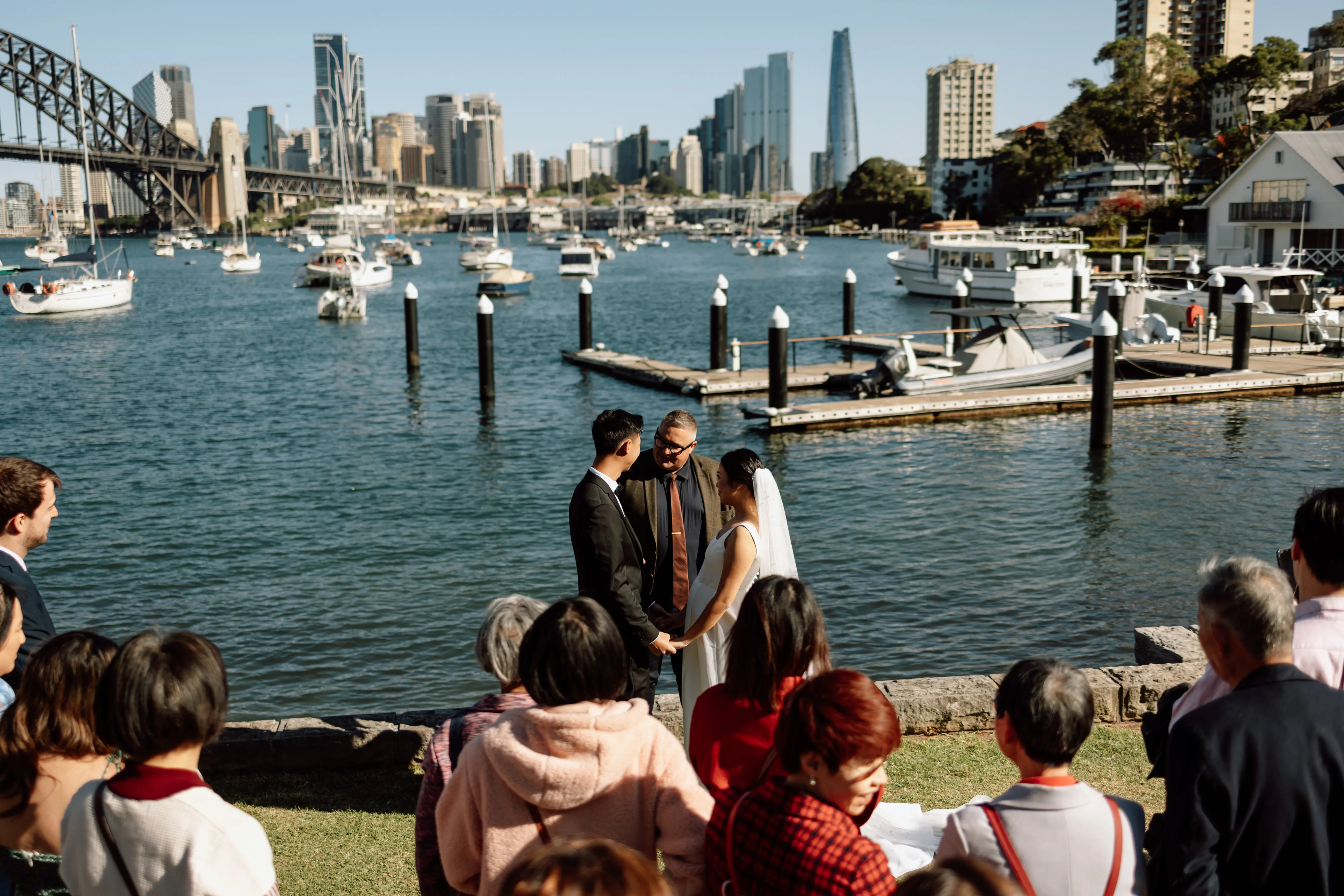 Josh Withers conducting an elopement beside Sydney Harbour